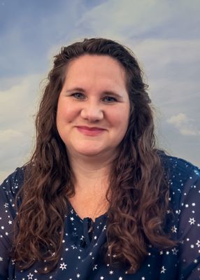 Portrait of Sandy Tallman, Office Administrator / Realtor®.